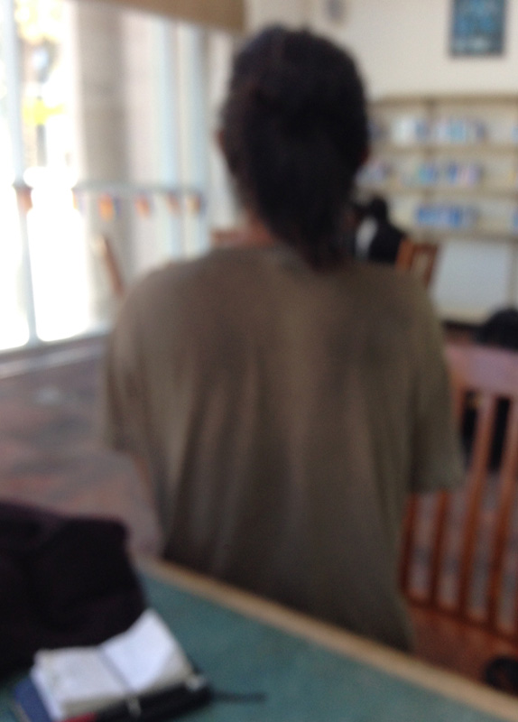 blurred image of a person's back